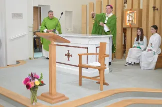 Archbishop consecrates the Altar