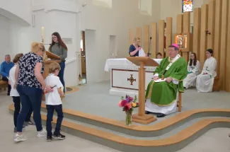 Candles are placed on the Altar