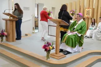 Flowers are place on the Altar